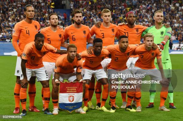 Netherland's team players Netherlands' midfielder Georginio Wijnaldum, Netherlands' forward Memphis Depay, Netherlands' forward Quincy Promes,...