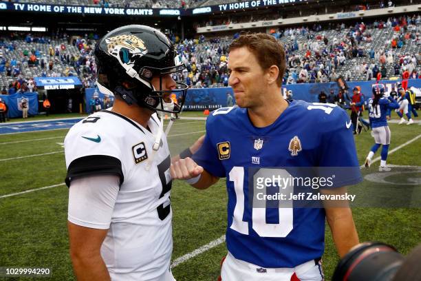 Blake Bortles of the Jacksonville Jaguars and Eli Manning of the New York Giants speak after their game at MetLife Stadium on September 9, 2018 in...