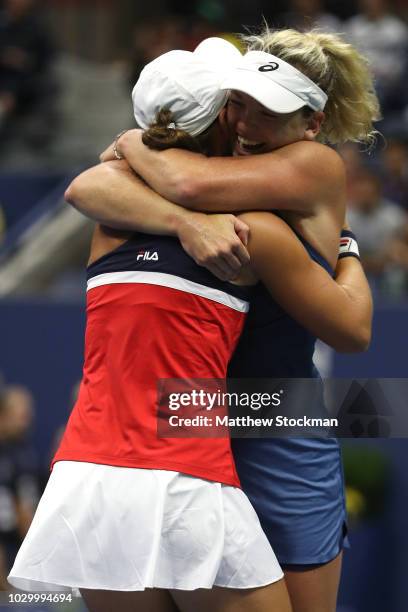 Ashleigh Barty of Australia and Coco Vandeweghe of the United States celebrate match point after winning the women's doubles final against Timea...