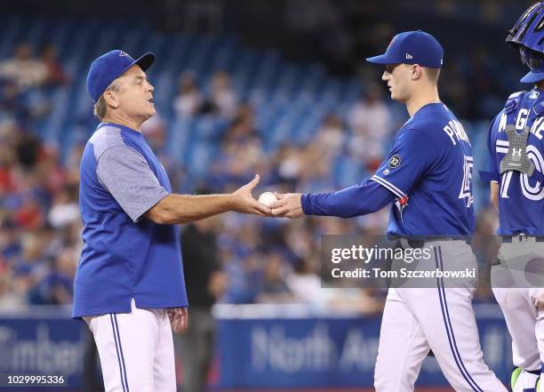 Thomas Pannone of the Toronto Blue Jays is taken out of the game by manager John Gibbons in the seventh inning during MLB game action against the...