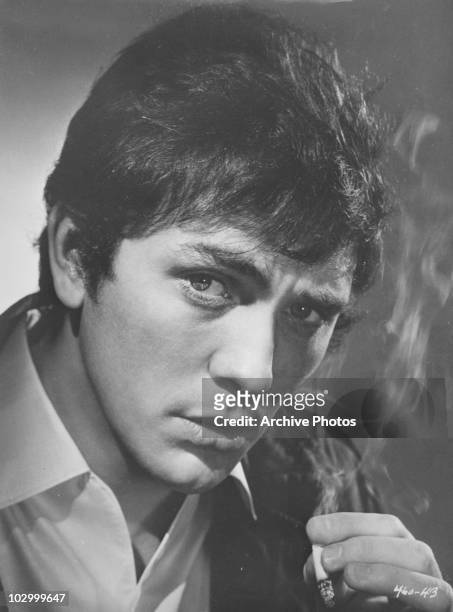 Portrait of English actor Terence Stamp with a cigarette circa 1960's.