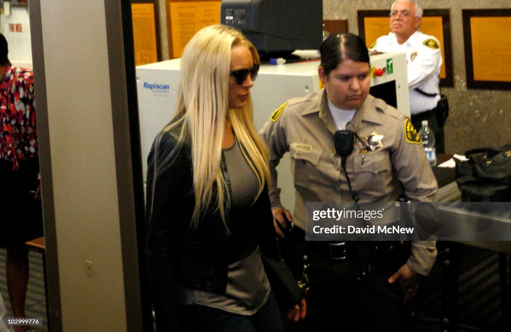Lindsay Lohan Surrenders