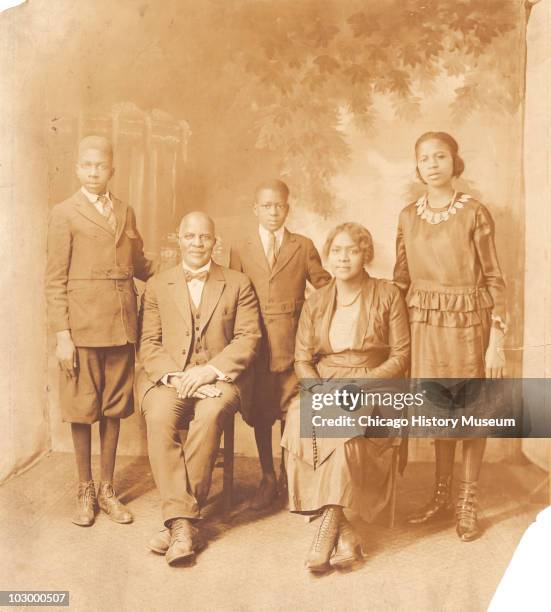 Portrait of the Morris family, who moved to Chicago during the Great Migration of African Americans from th eSouth to northern cities around the time...