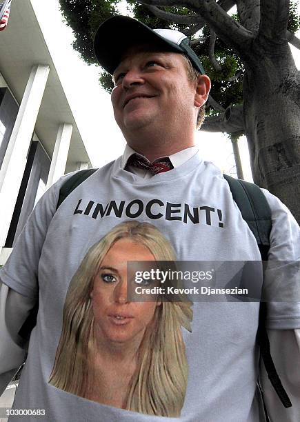 Lindsay Lohan fan wearing a "Linnocent!" t-shirt is seen in front of the Beverly Hills Courthouse on July 20, 2010 in Beverly Hills, California....