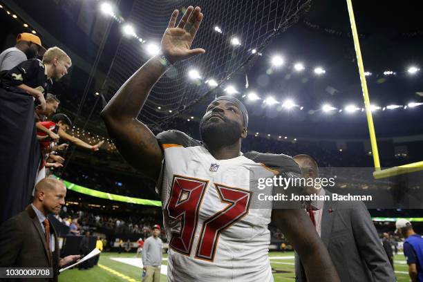 Vinny Curry of the Tampa Bay Buccaneers waves to fans after a game against the New Orleans Saints at the Mercedes-Benz Superdome on September 9, 2018...