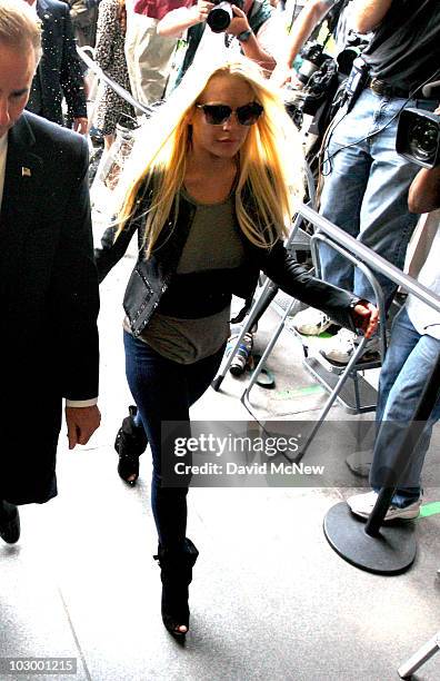 Actress Lindsay Lohan arrives at the Beverly Hills Courthouse to surrender to serve her 90 day jail sentence on July 20, 2010 in Beverly Hills,...