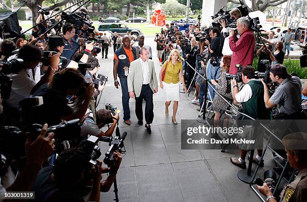 Father Michael Lohan and lawyer Lisa Bloom arrive at the Beverly Hills Courthouse to witness Lindsay Lohan surrender to serve her 90 day jail...
