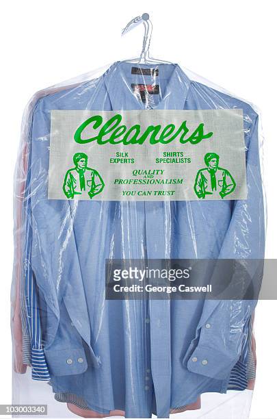 plastic bag of dry cleaned shirts - dry cleaned stock pictures, royalty-free photos & images