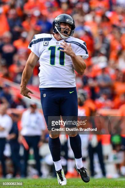 Kicker Sebastian Janikowski of the Seattle Seahawks reacts after missing a fourth quarter field goal attempt against the Denver Broncos at Broncos...