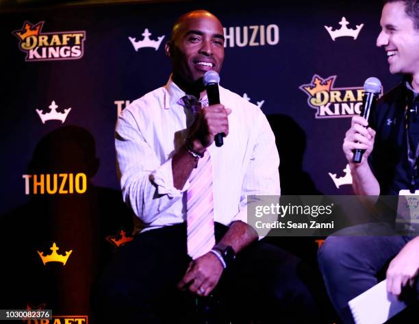 Adam Kaufman interviews Football running back Tiki Barber during DraftKings Kickoff Bash 2018 at Pilsener Haus & Biergarten on September 9, 2018 in...