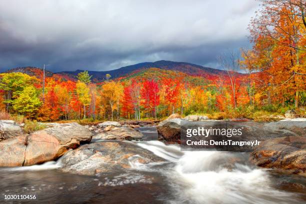 peak autumn foliage in the adirondacks region of new york - adirondack state park stock pictures, royalty-free photos & images