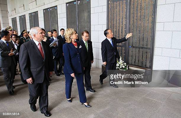 Secretary of Defense Robert Gates , U.S. Secretary of State Hillary Clinton are given a tour of the Korean War Memorial by South Korean Foreign...