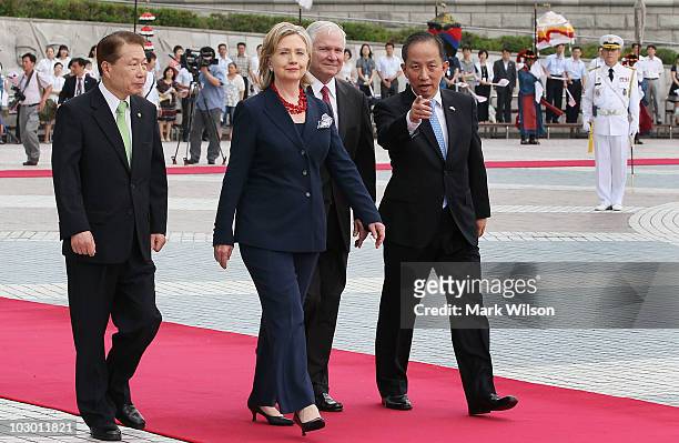 Secretary of State Hillary Clinton and U.S. Secretary of Defense Robert Gates are given a tour of the Korean War Memorial by South Korean Foreign...