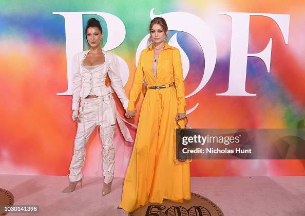 Bella Hadid and Gigi Hadid attend the #BoF500 gala dinner during New