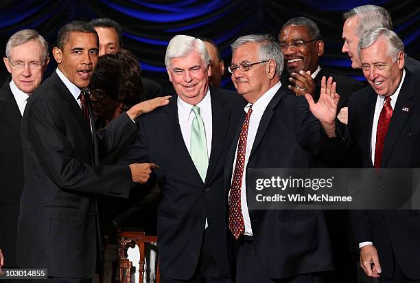 President Barack Obama greets Rep. Barney Frank and Sen. Chris Dodd after signing the Dodd-Frank Wall Street Reform and Consumer Protection Act at...