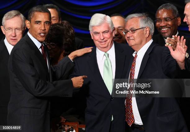 President Barack Obama greets Rep. Barney Frank and Sen. Chris Dodd after signing the Dodd-Frank Wall Street Reform and Consumer Protection Act at...