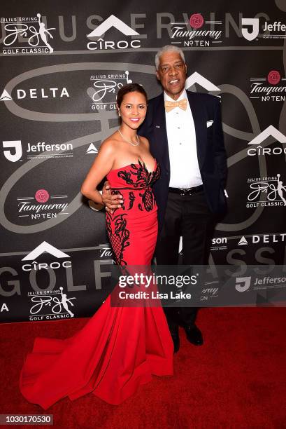 Dorys and Julius Erving walk the red carpet during the Erving Classic Black Tie and Pairings Party at Logan Philadelphia Ballroom on September 9,...