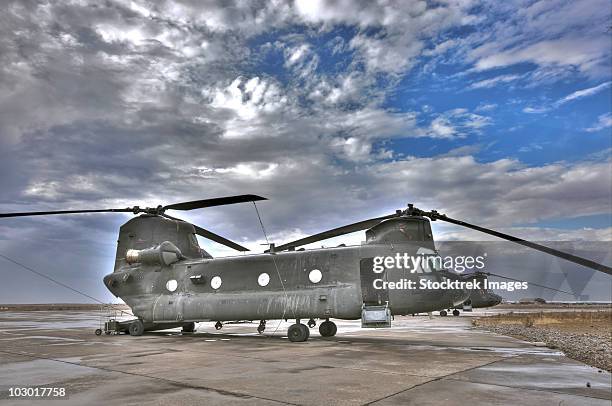 high dynamic range image of a ch-47 chinook helicopter. - chinook stock pictures, royalty-free photos & images