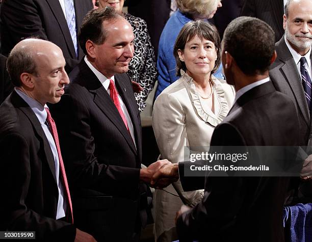Commodity Futures Trading Commission Chairman Gary Gensler, Comptroller of the Currency John Dugan, FDIC Chair Sheila Bair and Federal Reserve Bank...