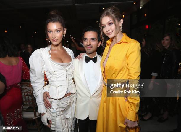 Bella Hadid, Imran Amed and Gigi Hadid attend the #BoF500 gala
