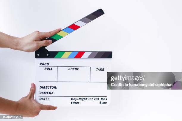 clapboard on white background,slate film,studio - filmklappe stock-fotos und bilder