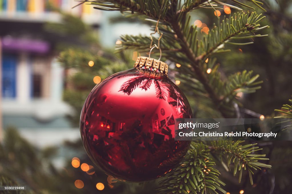 Christmas Bauble hanging on Christmas tree