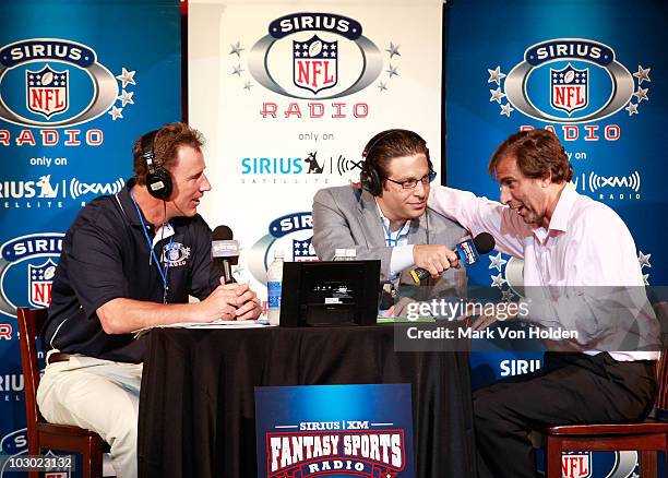 Former NFL player Rich Gannon, Sirius XM radio host Adam Schein, and Sirius XM radio's Chris 'Mad Dog' Russo attend the SIRIUS XM Radio celebrity...