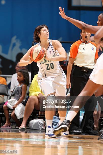 Nuria Martinez of the Minnesota Lynx looks to pass the ball against the Seattle Storm during the WNBA game at the Target Center on July 17, 2010 in...