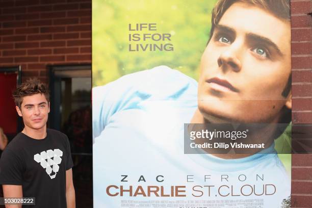 Zac Efron poses for a photo at the 'Charlie St. Cloud' St. Louis screening on July 21, 2010 in St. Louis, Missouri.
