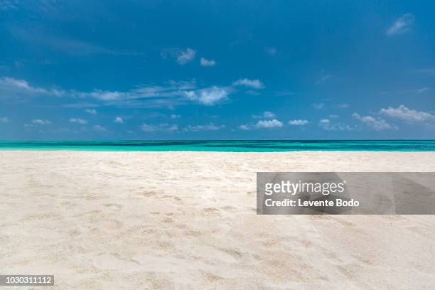 empty beach sea sand sky and summer day - sabbia foto e immagini stock