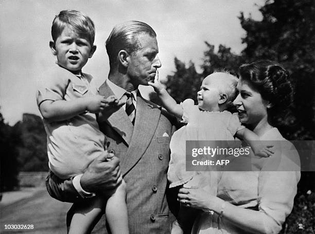 Undated picture showing the Royal British couple, Queen Elizabeth II, and her husband Philip, Duke of Edinburgh, with their two children, Charles,...