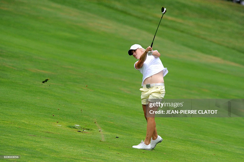 M Essa Rind British Melissa Reid hits a drive during the Evian Masters Golf... News ...