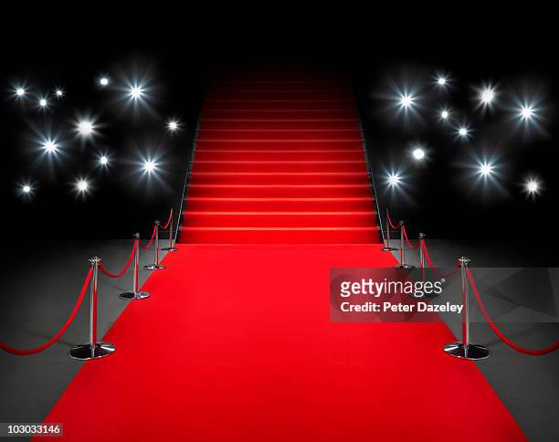 red carpet event with flash photography - red carpet event stock pictures, royalty-free photos & images