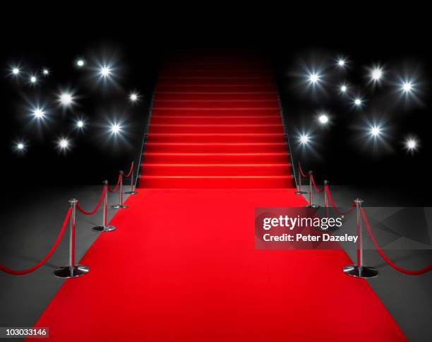 red carpet event with flash photography - showbiz stock pictures, royalty-free photos & images