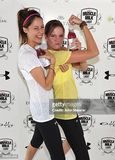 Actresses Amanda Crew and Amber Borycki attend the "Muscle Milk Light" Women's Fitness Retreat on June 11, 2010 in Beverly Hills, California.