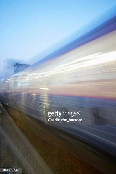 blurred motion of train - hamburg duitsland stockfoto's en -beelden