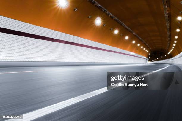 modern highway tunnel underpass - túnel de carretera fotografías e imágenes de stock