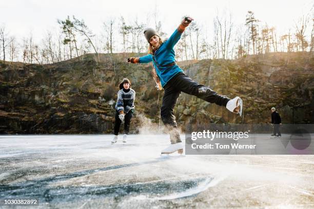 amateur figure skater posing on ice with friends - figure skating woman stock pictures, royalty-free photos & images