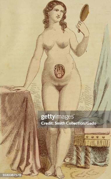 Color print depicting a nude, pregnant woman, standing in full-length, frontal view, and looking at her face in a hand-held mirror, with a cutaway...