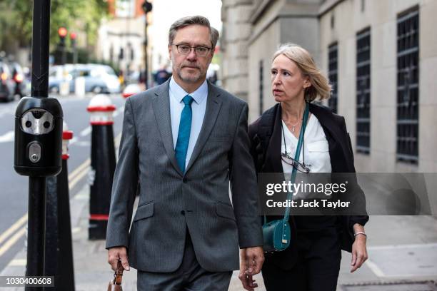 John Letts and Sally Lane arrive at the Old Bailey charged with making money available for suspected terrorist activities on September 10, 2018 in...