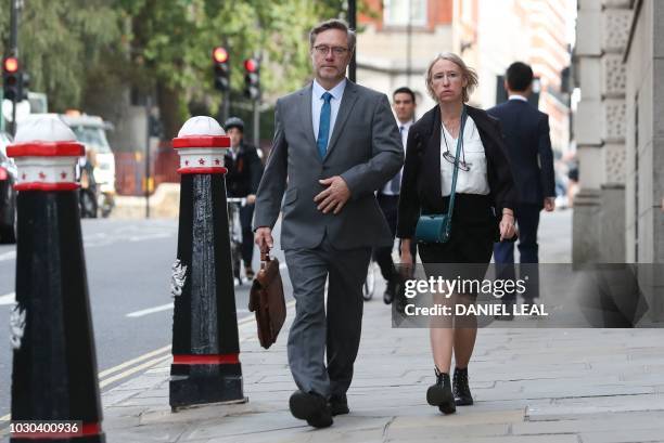 Sally Lane and John Letts, parents of Jack Letts who is believed to have left the United Kingdom to join Islamic State , arrive at the Old Bailey...