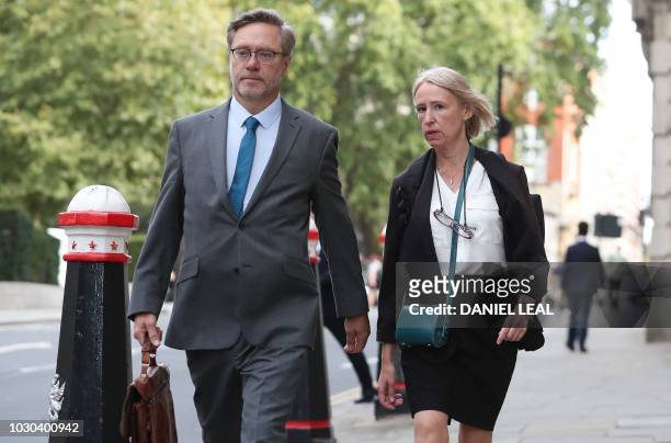 Sally Lane and John Letts, parents of Jack Letts who is believed to have left the United Kingdom to join Islamic State , arrive at the Old Bailey...