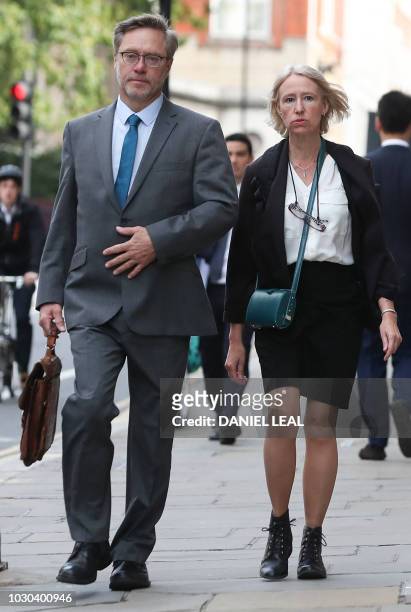 Sally Lane and John Letts, parents of Jack Letts who is believed to have left the United Kingdom to join Islamic State , arrive at the Old Bailey...