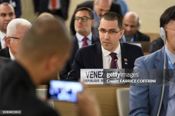 Venezuelan Foreign Minister Jorge Arreaza looks on as he delivers a speech during the opening day of the 39th United Nations Council of Human Rights...