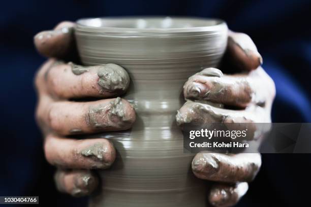 hands of woman enjoying pottery - pottery wheel stock pictures, royalty-free photos & images