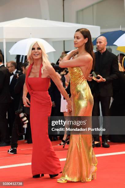 75th Venice Film Festival, A star is born red carpet. In the picture: Donatella Vesace and Irina Shayk during the red carpet, on the occasion of the...