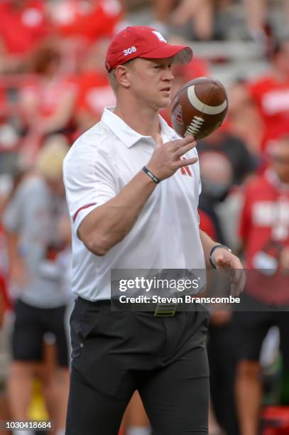 Head coach Scott Frost of the Nebraska Cornhuskers watches warmups before the game against the Akron Zips at Memorial Stadium on September 1, 2018 in...