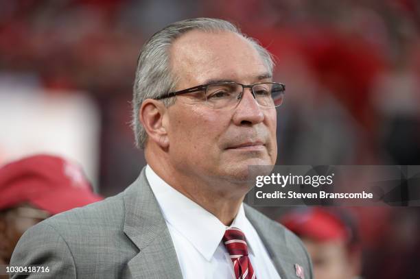 Athletic Director Bill Moos of the Nebraska Cornhuskers watches pregame activities before the game against the Akron Zips at Memorial Stadium on...