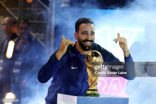 Adil Rami of france celebrate the FIFA World Cup with fan after the UEFA Nations League A group one match between France and Netherlands at Stade de...