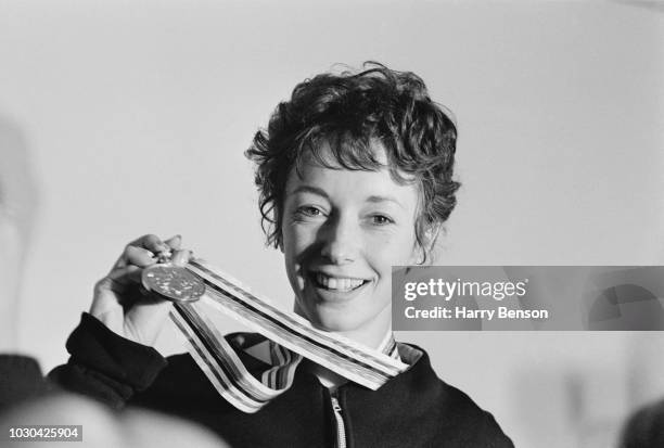 English track and field athlete Ann Packer with her gold medal won during the Summer Olympics in the 800m, Tokyo, Japan, 25th November 1964.